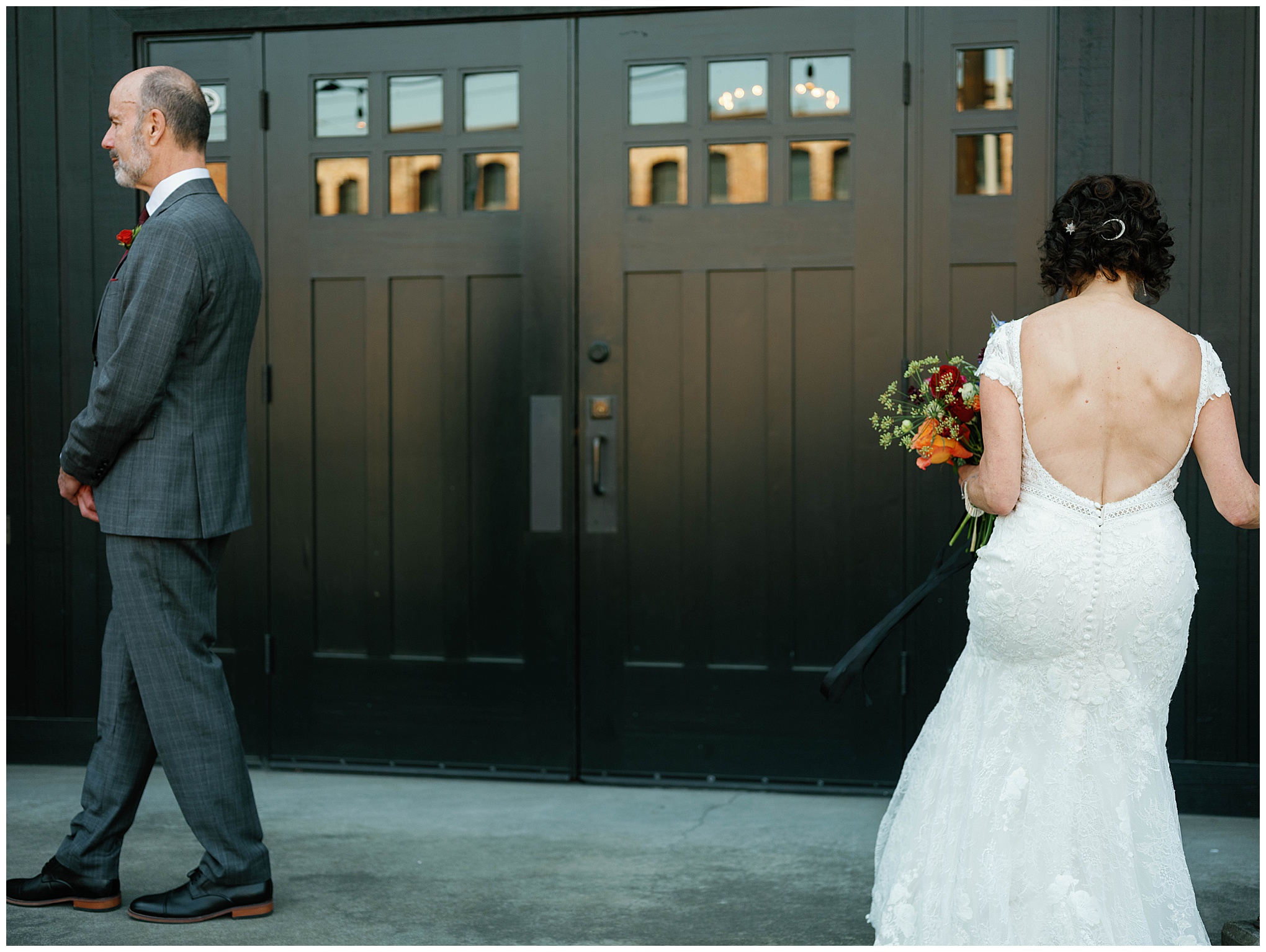 Bride walking towards groom for their first look moment.