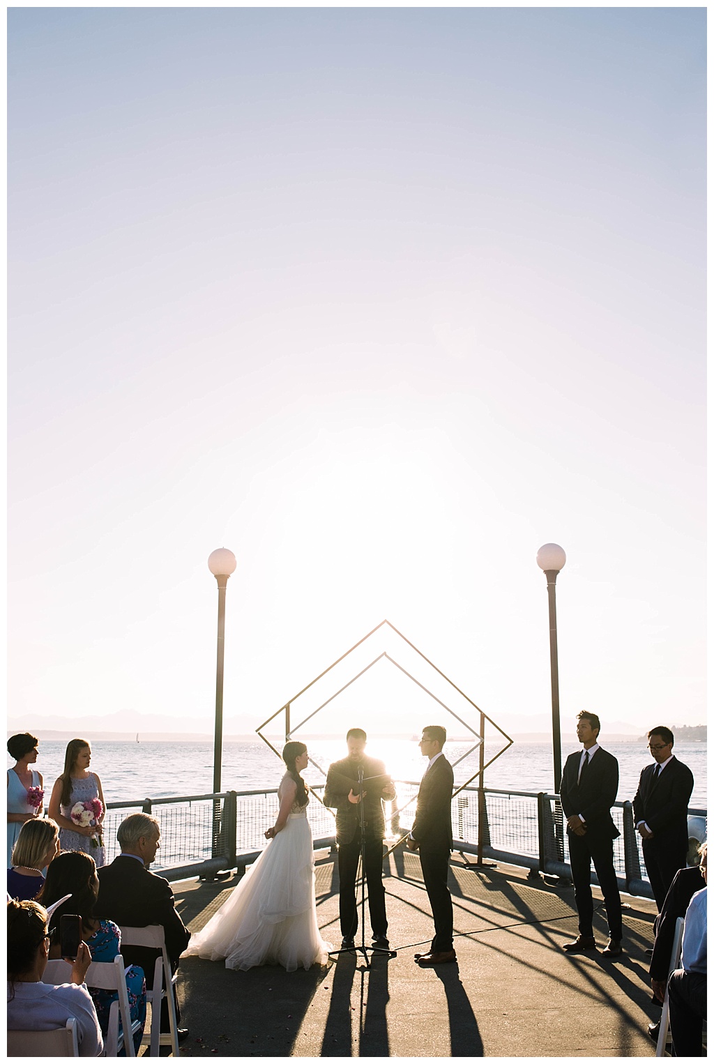 seattle waterfront, offbeat bride, seattle aquarium, aquarium wedding, seattle engagement, seattle bride, seattle groom, julia kinnunen photography, destination wedding, seattle wedding, wedding photography, newlyweds, diy wedding, flying anchor event design, seattle bride magazine, urban wedding, evening wedding