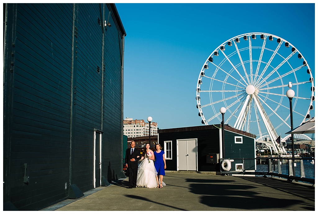 seattle waterfront, offbeat bride, seattle aquarium, aquarium wedding, seattle engagement, seattle bride, seattle groom, julia kinnunen photography, destination wedding, seattle wedding, wedding photography, newlyweds, diy wedding, flying anchor event design, seattle bride magazine, urban wedding, evening wedding