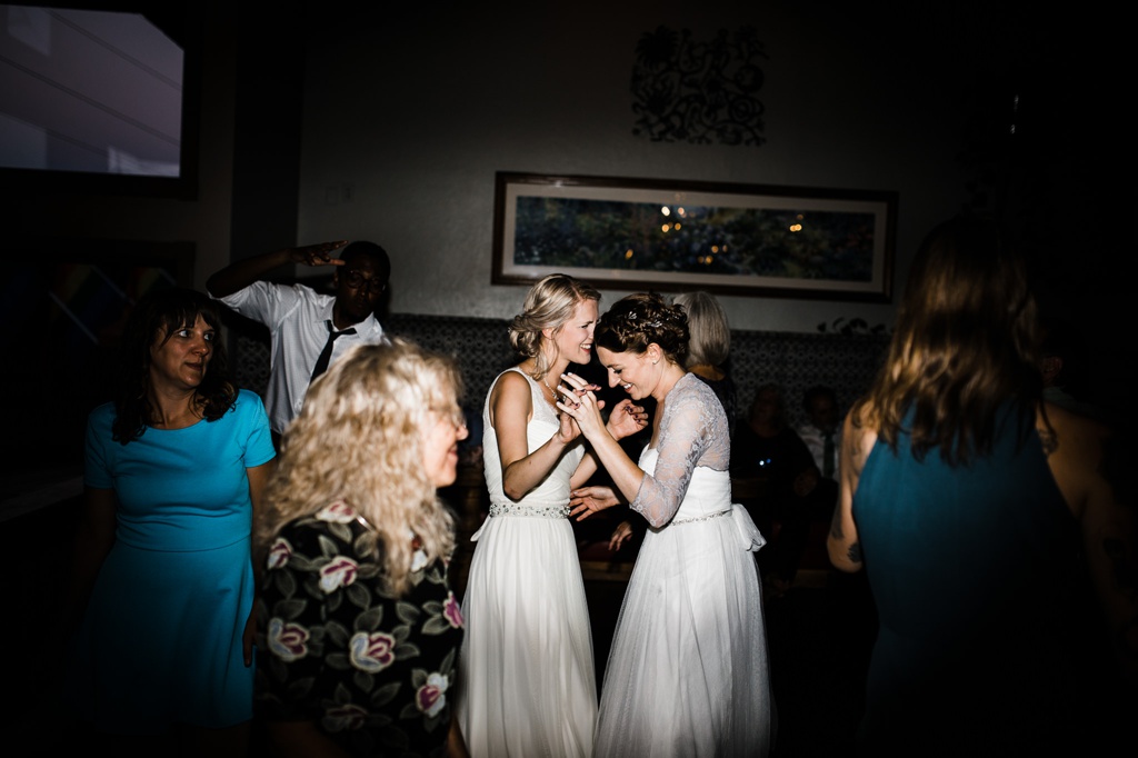 lesbian wedding, offbeat bride, lgbt wedding, gay wedding, two brides, silverpick lodge, durango, julia kinnunen photography, destination wedding, colorado wedding, seattle wedding, wedding photography, bride, newlyweds, wives, sows ear, reception, dance party