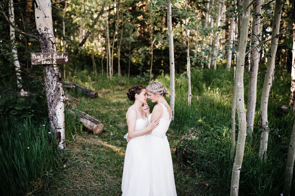 lesbian wedding, offbeat bride, lgbt wedding, gay wedding, two brides, silverpick lodge, durango, julia kinnunen photography, destination wedding, colorado wedding, seattle wedding, wedding photography, bride, newlyweds, portraits, wives, same sex wedding