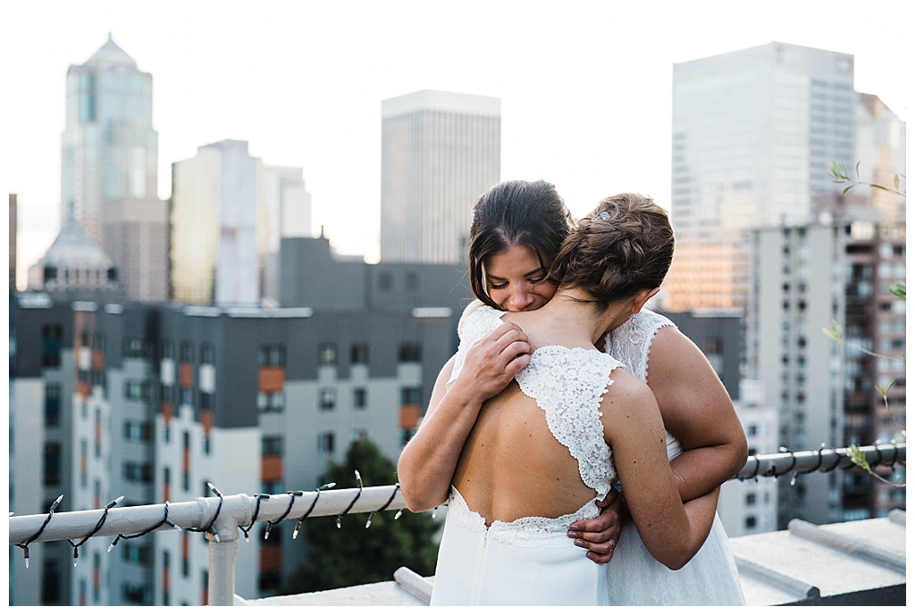 lesbian wedding, offbeat bride, lgbt wedding, gay wedding, two brides, sorrento hotel, boutique hotel wedding, julia kinnunen photography, destination wedding, seattle wedding, wedding photography, bride, newlyweds, same sex wedding, reception, portraits, sunset, rooftop