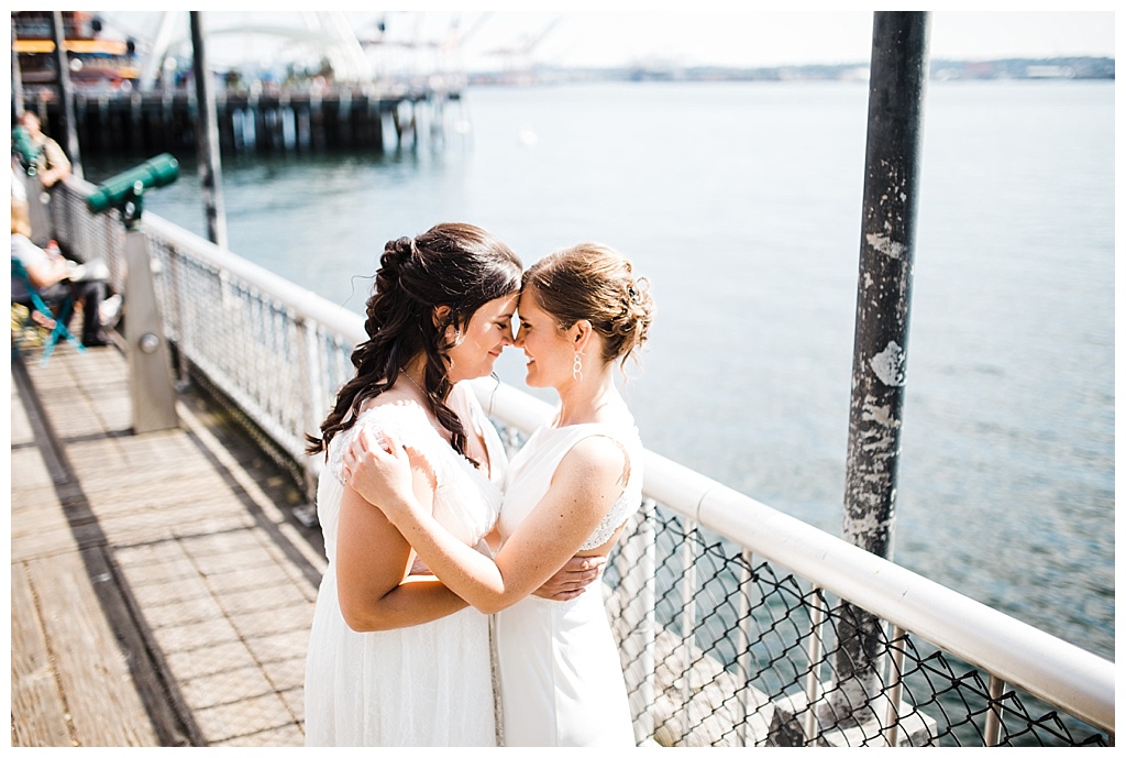 lesbian wedding, offbeat bride, lgbt wedding, gay wedding, two brides, sorrento hotel, boutique hotel wedding, julia kinnunen photography, destination wedding, seattle wedding, wedding photography, bride, newlyweds, same sex wedding, first look, portraits, seattle waterfront, downtown