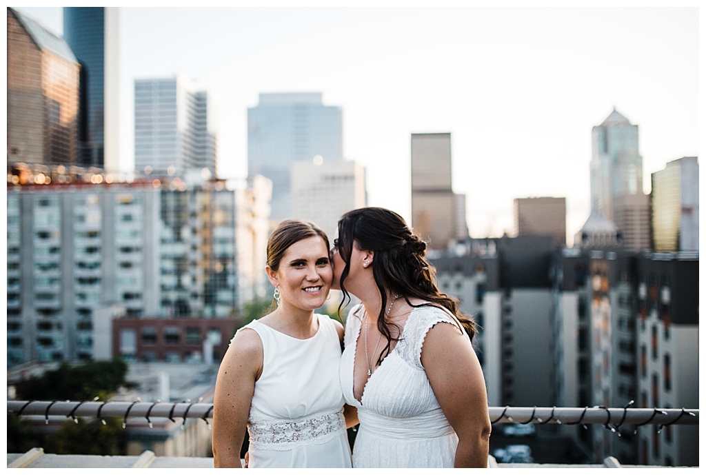 lesbian wedding, offbeat bride, lgbt wedding, gay wedding, two brides, sorrento hotel, boutique hotel wedding, julia kinnunen photography, destination wedding, seattle wedding, wedding photography, bride, newlyweds, same sex wedding, reception, portraits, sunset, rooftop