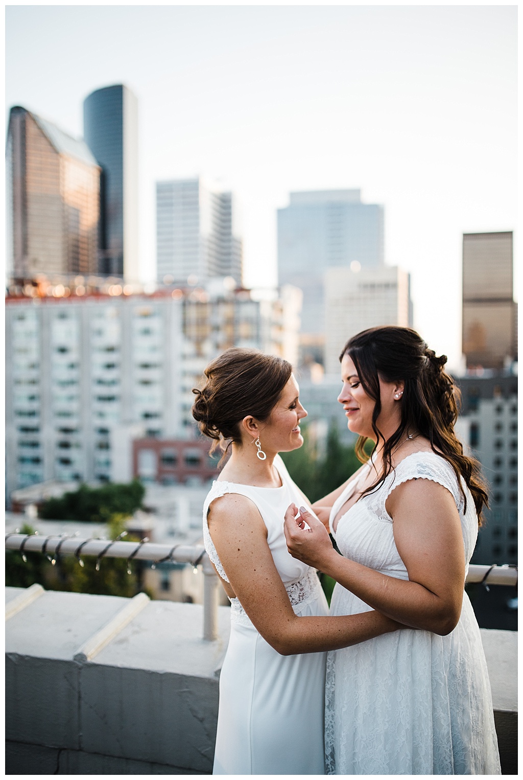 lesbian wedding, offbeat bride, lgbt wedding, gay wedding, two brides, sorrento hotel, boutique hotel wedding, julia kinnunen photography, destination wedding, seattle wedding, wedding photography, bride, newlyweds, same sex wedding, reception, portraits, sunset, rooftop