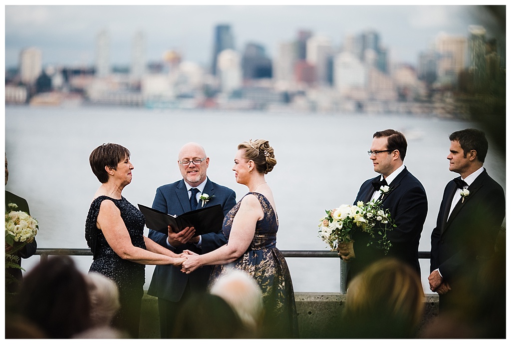 lesbian wedding, offbeat bride, lgbt wedding, gay wedding, two brides, alki beach, salty's on alki wedding, julia kinnunen photography, destination wedding, seattle wedding, wedding photography, bride, newlyweds, same sex wedding, ceremony, wedding with a view