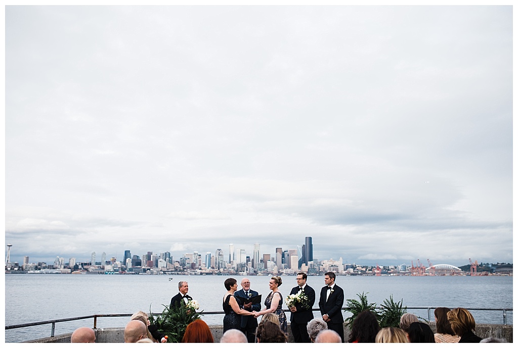 lesbian wedding, offbeat bride, lgbt wedding, gay wedding, two brides, alki beach, salty's on alki wedding, julia kinnunen photography, destination wedding, seattle wedding, wedding photography, bride, newlyweds, same sex wedding, ceremony, wedding with a view