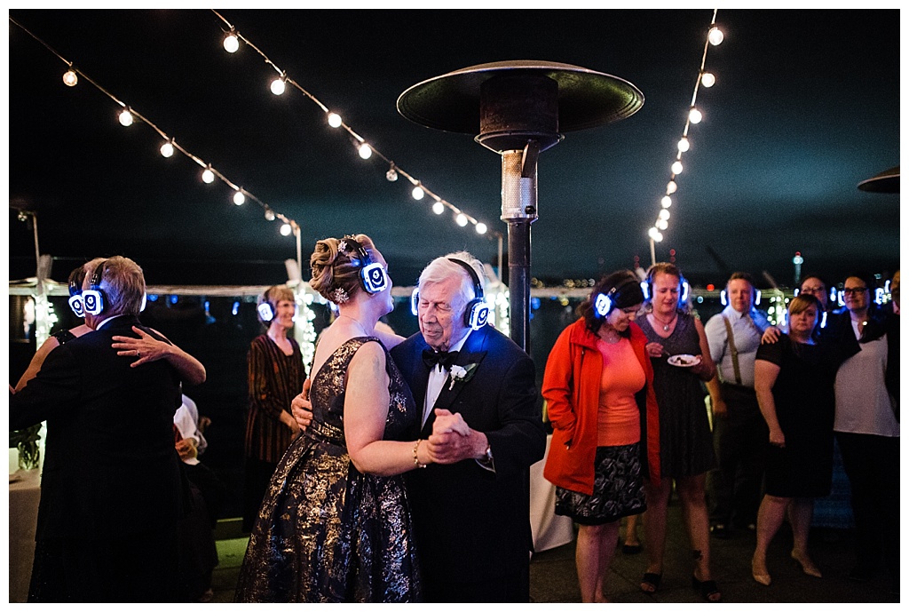 lesbian wedding, offbeat bride, lgbt wedding, gay wedding, two brides, alki beach, salty's on alki wedding, julia kinnunen photography, destination wedding, seattle wedding, wedding photography, bride, newlyweds, same sex wedding, reception, silent disco, dance party