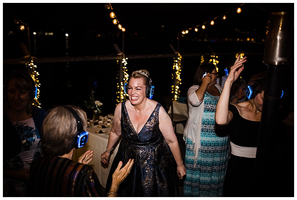 lesbian wedding, offbeat bride, lgbt wedding, gay wedding, two brides, alki beach, salty's on alki wedding, julia kinnunen photography, destination wedding, seattle wedding, wedding photography, bride, newlyweds, same sex wedding, reception, silent disco, dance party