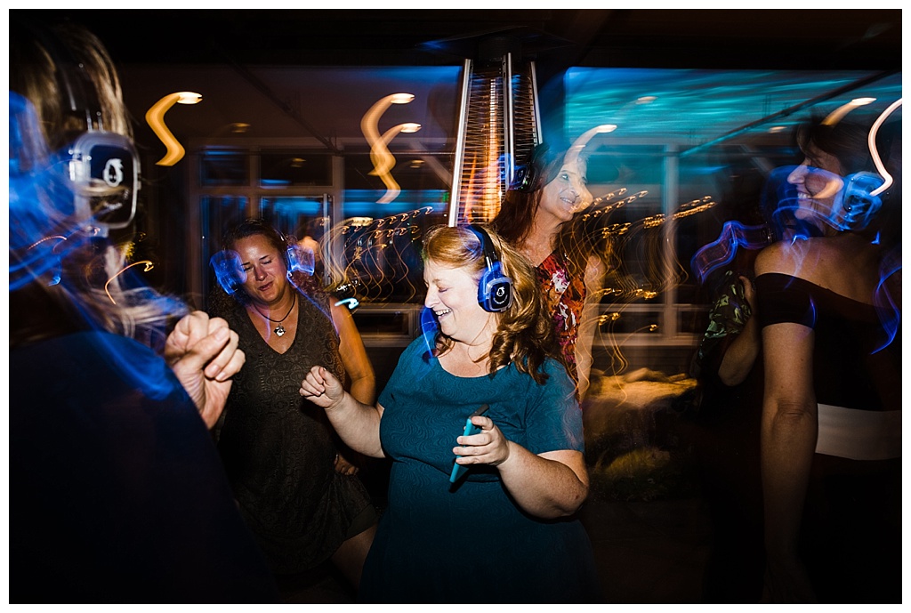 lesbian wedding, offbeat bride, lgbt wedding, gay wedding, two brides, alki beach, salty's on alki wedding, julia kinnunen photography, destination wedding, seattle wedding, wedding photography, bride, newlyweds, same sex wedding, reception, silent disco, dance party