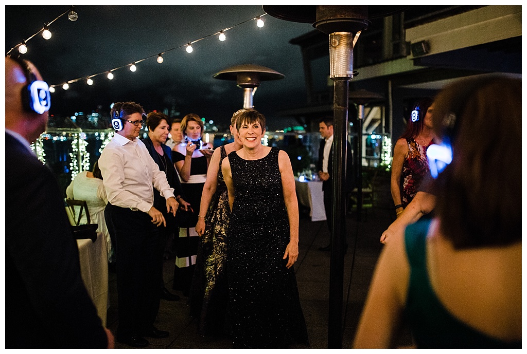 lesbian wedding, offbeat bride, lgbt wedding, gay wedding, two brides, alki beach, salty's on alki wedding, julia kinnunen photography, destination wedding, seattle wedding, wedding photography, bride, newlyweds, same sex wedding, reception, silent disco, dance party