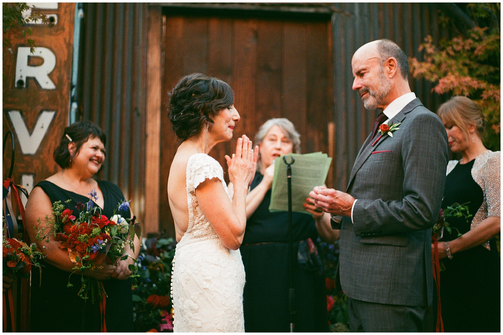 Bride and groom exchanging heartfelt vows during the ceremony.