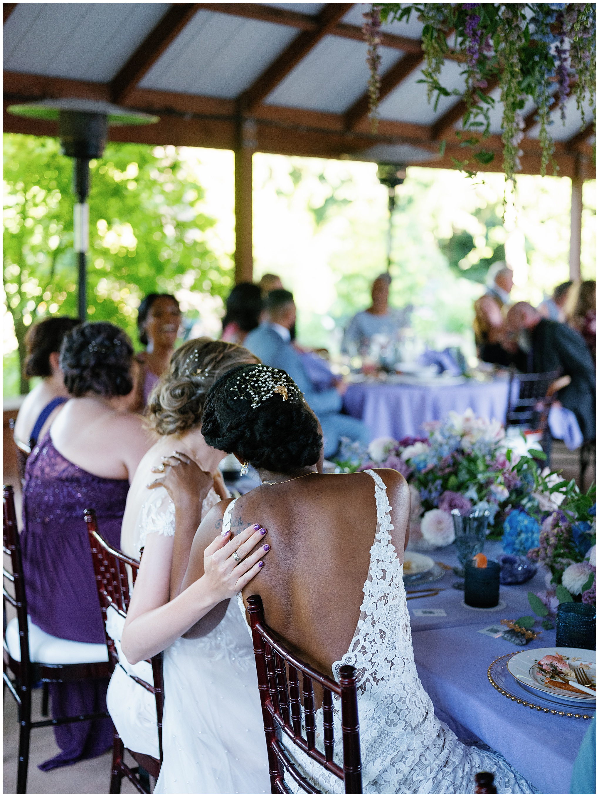 Dannah and Meghan share an embrace at the reception.