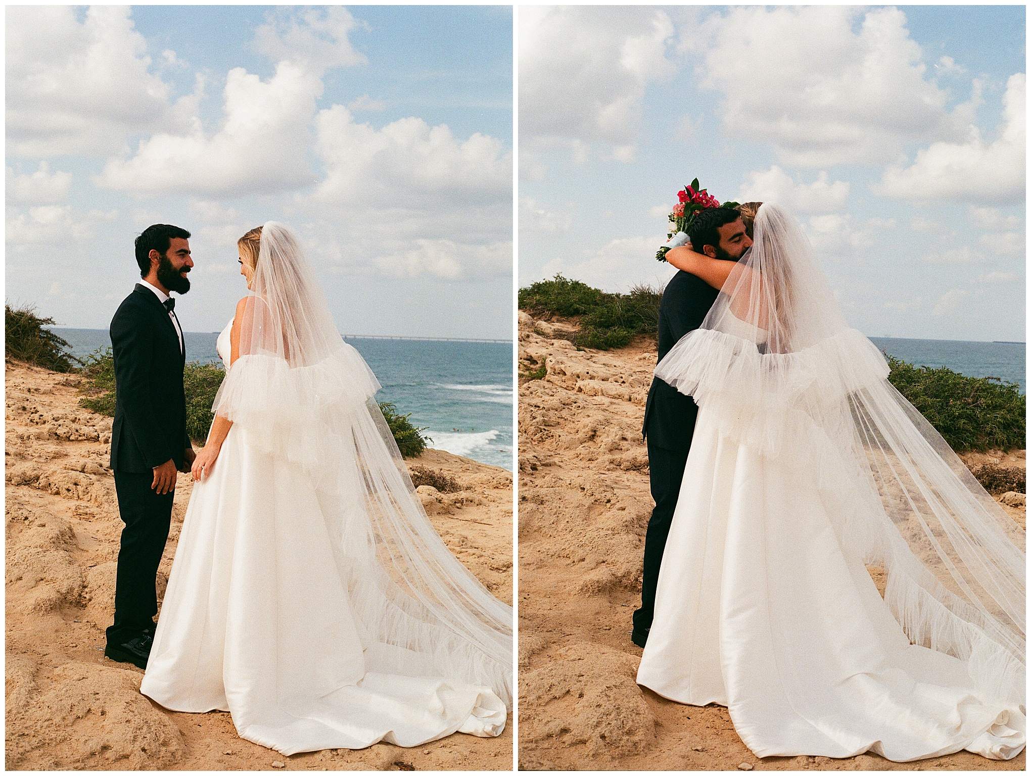 Bride and groom face each other during their first look on a sandy cliffside, with the ocean in the background.