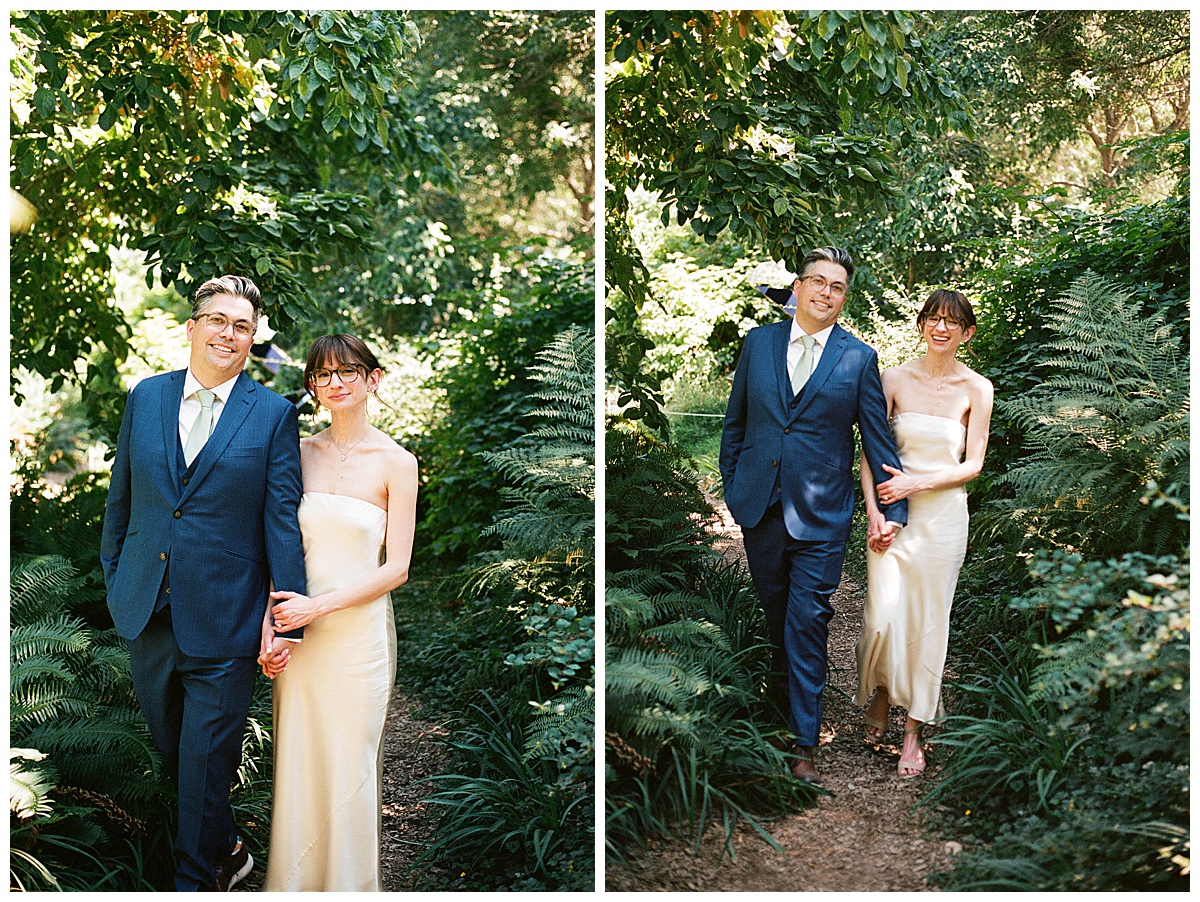 Bride and groom walking hand in hand through the Olympic Sculpture Garden, surrounded by modern art installations and greenery.