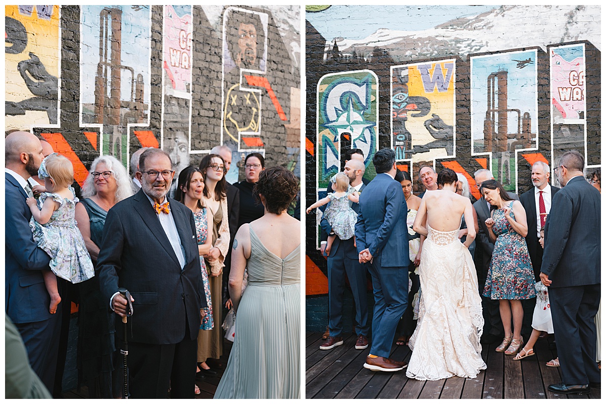 Guests and family members chatting and mingling near the bride at the outdoor reception.