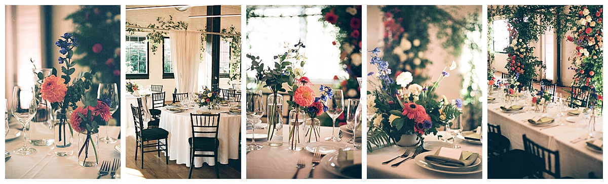 Wedding reception tables adorned with colorful flower arrangements and glassware, set in a romantic, intimate ambiance.